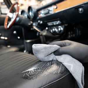 Detailing1 COLOURLOCK Classic Car Leather Care Set — wiping the lifted dirt off a classic car seat
