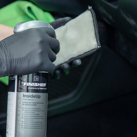 Detailing1 THE FINISHER InsideUp — interior cleaner in use with a microfibre pad in the car